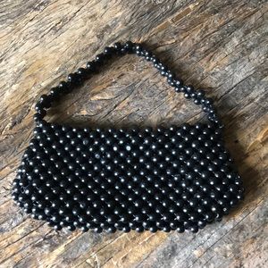 Black wooden bead purse
